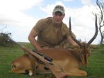 Jiri with Impala and Blesbok 002.jpg
